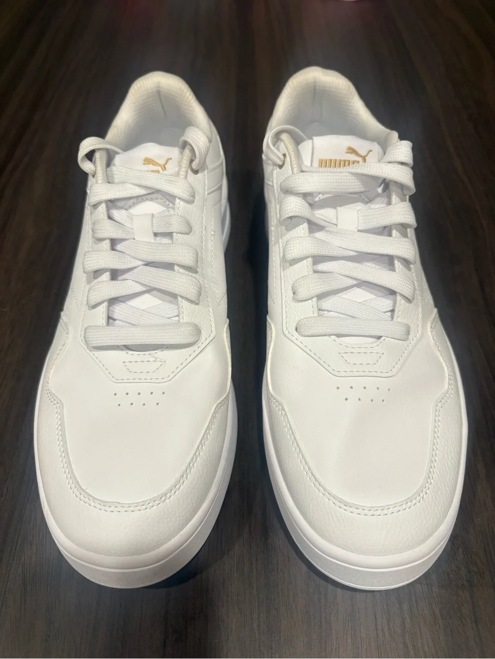 Puma White Low-Top Sneakers with Gold Logo